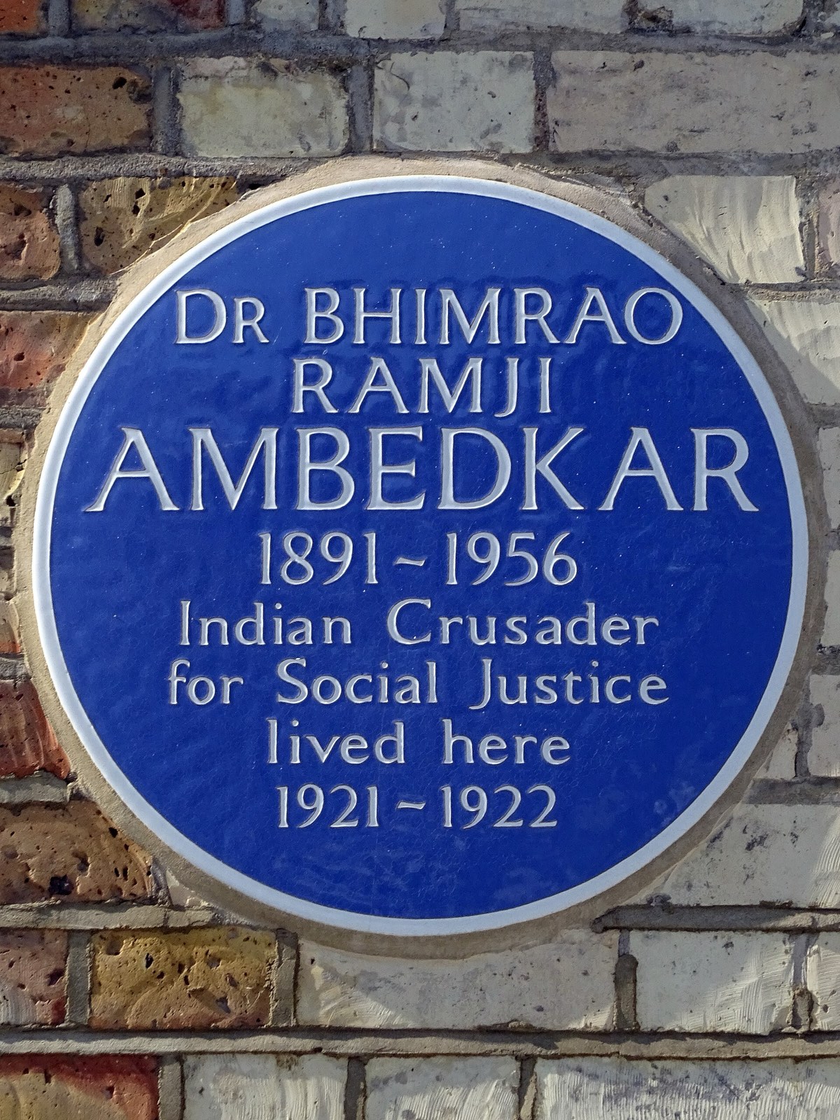 The blue plaque at 10 King Henry's Road, London, which reads that Dr Bhimrao Ramji Ambedkar, "Indian crusader for social justice", lived there in 1921–1922. Photographed in 2021.