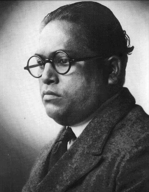 A studio portrait of Ambedkar as a young man. Wikimedia Commons dates it only as "before 1920"; the photographer is unknown.