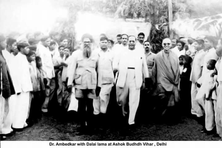 Ambedkar with the Dalai Lama at Ashoka Buddha Vihar, Delhi. Commons dates this photograph 2 December 1956.