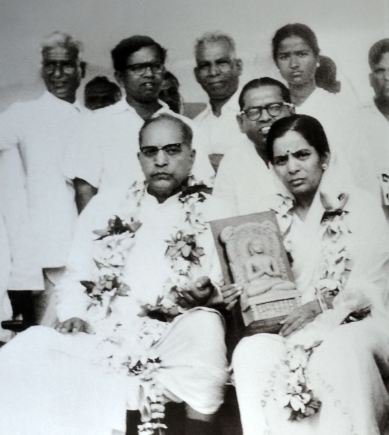 Ambedkar with Savita Ambedkar, who holds a statue of the Buddha, at the conversion ceremony in Nagpur on 14 October 1956.