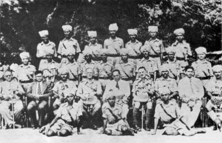 Ambedkar with soldiers of the Mahar Regiment, dated 20 July 1942 on Wikimedia Commons.