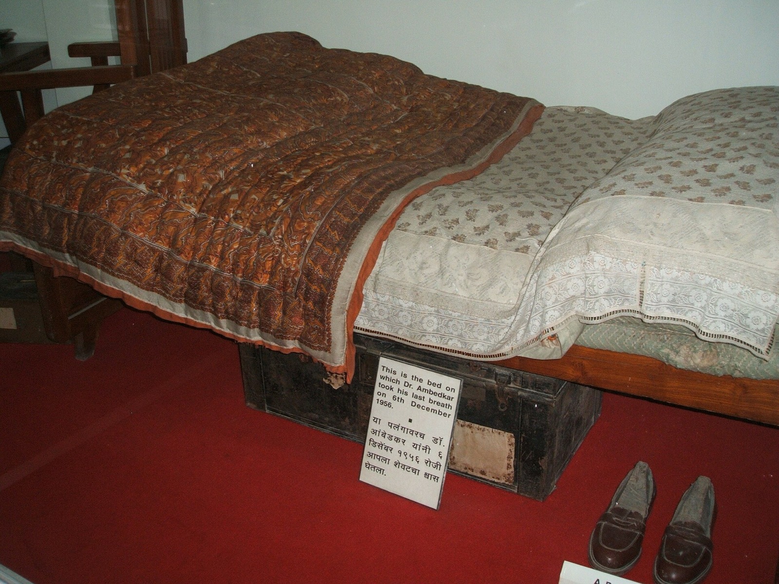 A bed displayed at the Dr. Babasaheb Ambedkar Museum and Memorial in Pune; the photographer's description says it is the bed on which Ambedkar died in 1956. Photographed in the 2000s.