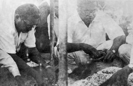 Ambedkar's son Yashwantrao and nephew Mukundrao collecting his ashes at Chaitya Bhoomi, Bombay, on 8 December 1956.