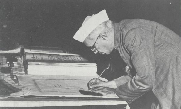 Prime Minister Jawaharlal Nehru signing the Constitution of India in New Delhi on 24 January 1950.