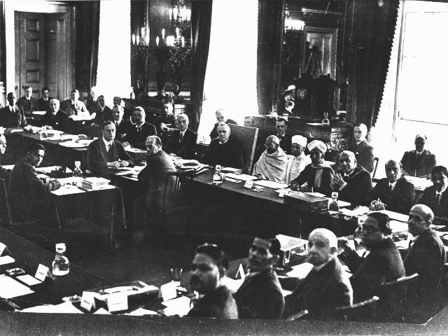 The Second Round Table Conference in London, October 1931, with British Prime Minister Ramsay MacDonald to the right of Gandhi. Ambedkar, representing the depressed classes, is fourth from left in the foreground.
