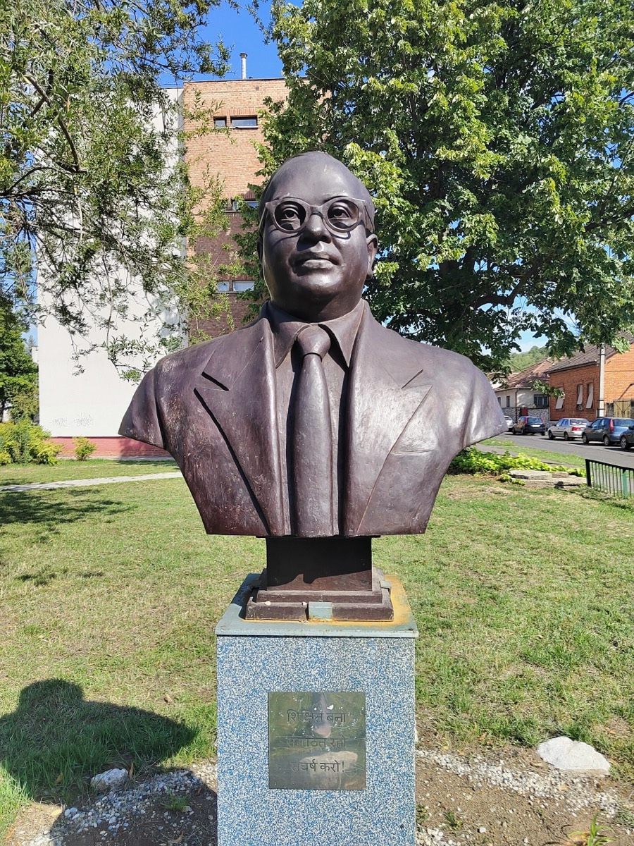 A statue of Ambedkar in Miskolc, Hungary, near a school named after him. Photographed in 2025.
